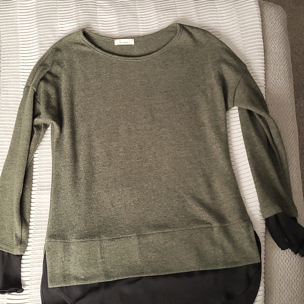 BN never worn, no tags, LS green polyblend women's top, size large